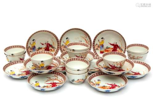 Eleven famille rose mandarin cups and saucers