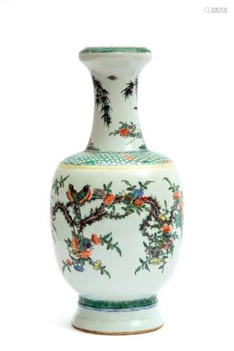 A famille verte vase decorated with birds and flor…