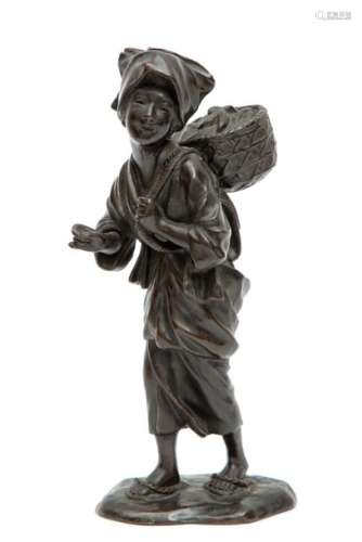 A Japanese bronze figure
