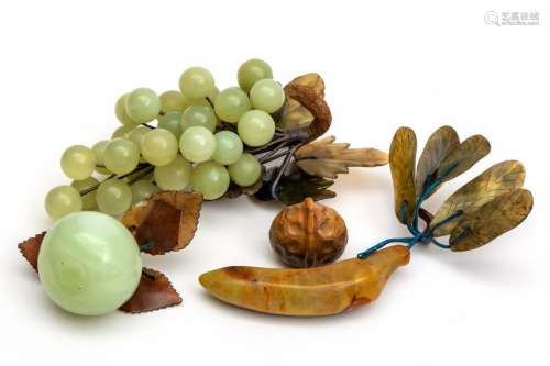 A selection of Chinese carved stone fruits