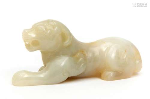 A carved jade figure of a crouching bixie