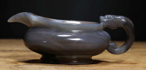 AN AGATE CUP WITH BEAST HANDLE