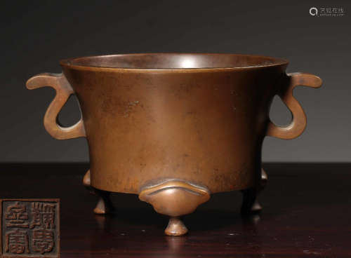 A COPPER CENSER WITH EARS