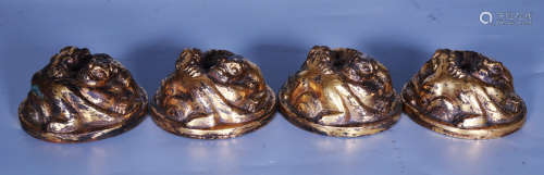A GILT BRONZE PAPERWEIGHT SHAPED WITH BEAST