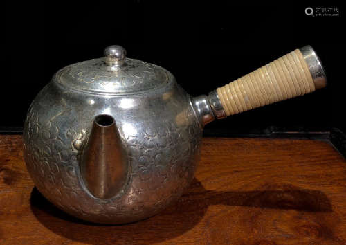 A COPPER WITH SILVER POT