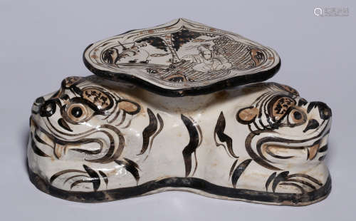 A CIZHOU YAO WHITE GLAZE PILLOW SHAPED WITH BEAST