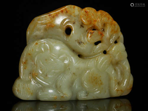 A HETIAN YELLOW JADE PENDANT CARVED WITH BEAST