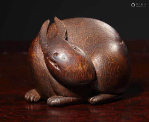 A BAMBOO ORNAMENT SHAPED WITH RABBIT