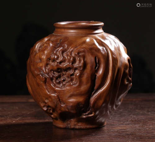 A HUANGYANG WOOD VASE CARVED WITH FLOWER PATTERN