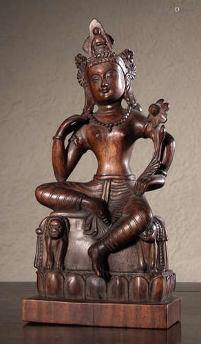 A HUALI WOOD TARA BUDDHA STATUE