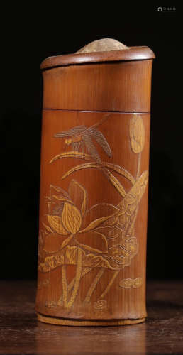 A BAMBOO INCENSE HOLDER CARVED WITH FLOWER