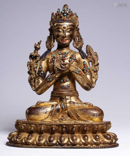 A GILT BRONZE ARHAT BUDDHA STATUE EMBEDDED WITH AGATE