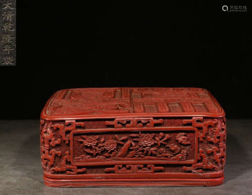 A RED LACQUER BOX CARVED WITH FLOWER