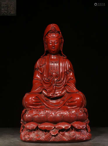 A RED LACQUER GUANYIN BUDDHA STATUE