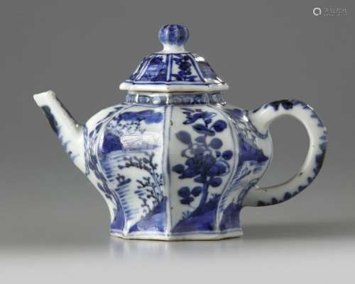 A CHINESE BLUE AND WHITE MOULDED OCTAGONAL TEAPOT …