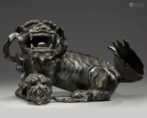 A CHINESE BRONZE BUDDHIST LION, CHINA, 19TH CENTUR…