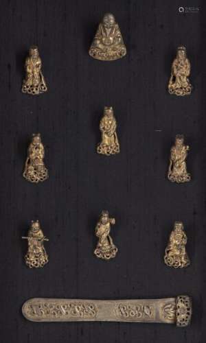A SET OF CHINESE GILT SILVER 'IMMORTALS' FIGURES A…