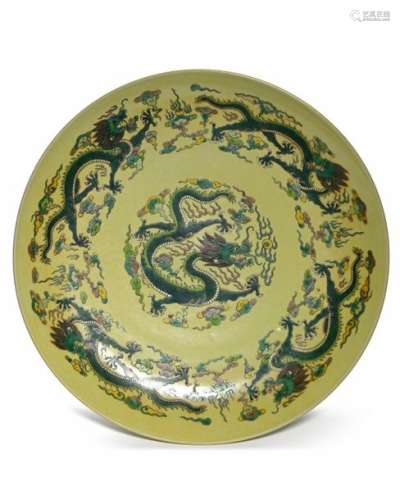A CHINESE FAMILLE VERTE DRAGONS CHARGER, CHINA, 19…