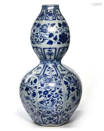 A CHINESE BLUE AND WHITE DOUBLE GOURD VASE, CHINA,…