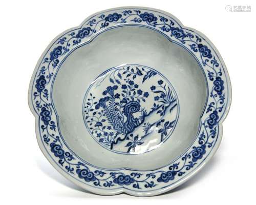 A LARGE CHINESE BLUE AND WHITE FLOWER SHAPED BOWL