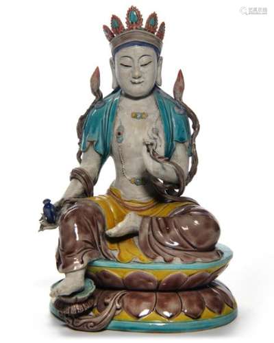 A CHINESE PORCELAIN GUANYIN FIGURE