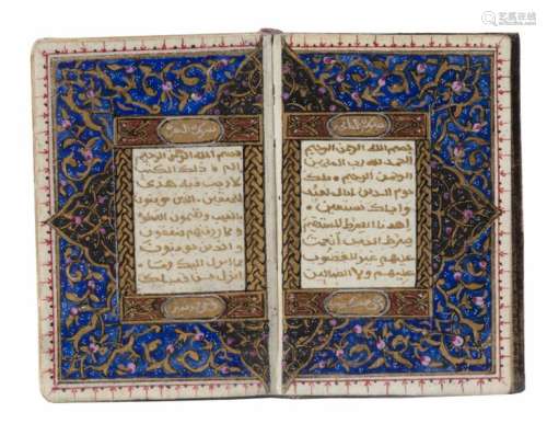 AN ILLUMINTATED MINIATURE OTTOMAN QURAN AND SILVER…