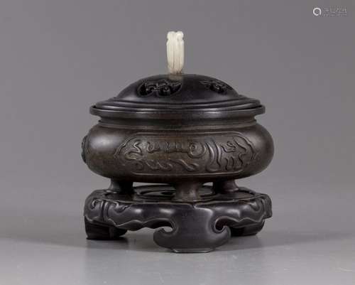 A CHINESE BRONZE TRIPOD CENSER FOR THE ISLAMIC MAR…