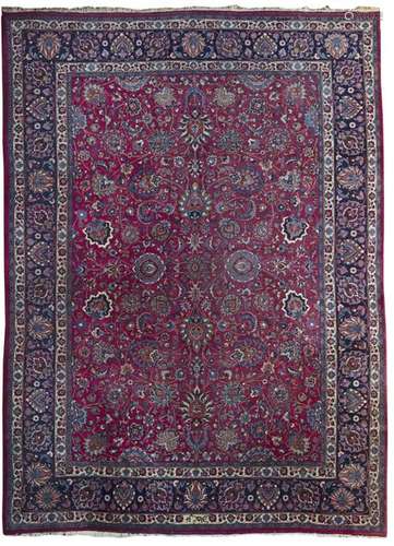 A LARGE SIGNED MESHED CARPET, NORTH EAST PERSIA