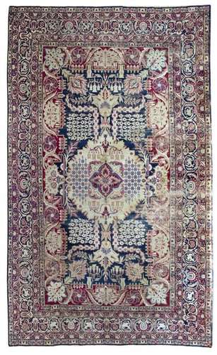 A LARGE RAVER KIRMAN RUG, SOUTH PERSIA