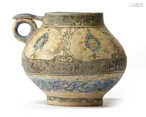 A KASHAN CUP PAINTED WITH MEDALLIONS AND INSCRIPTI…