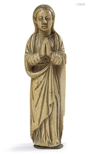 AN INDO PORTUGUESE CARVED IVORY FIGURE OF THE VIRG…