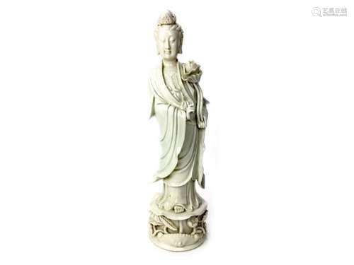 A LARGE EARLY 20TH CENTURY CHINESE BLANC DE CHINE FIGURE OF GUAN YIN