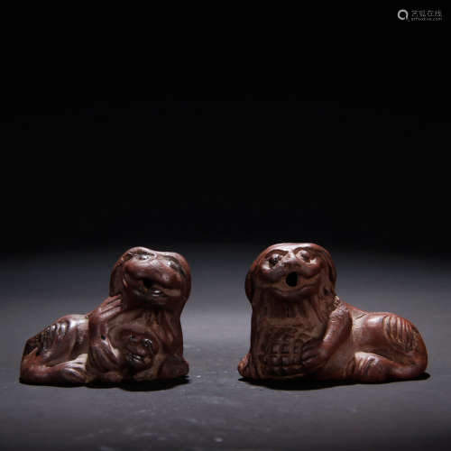 A Pair of Chinese Purple Sand Lion Ornaments