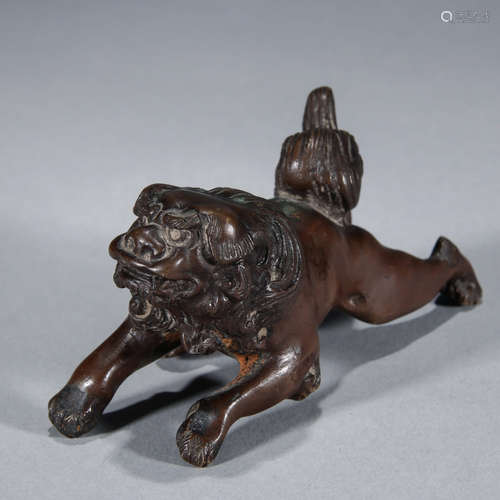 A Chinese Copper Lion Ornament