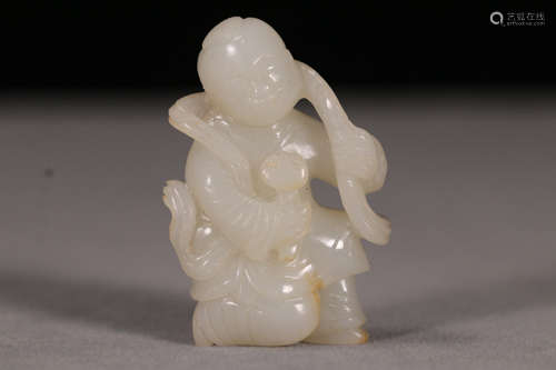 A Chinese Carved Hetian Jade Boy Ornament