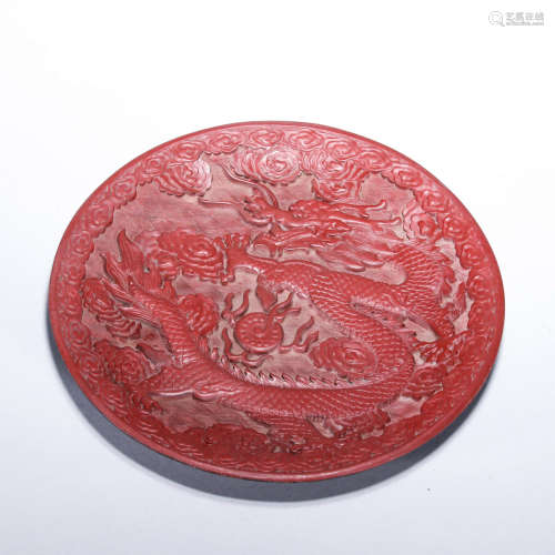A Red Lacquer Plate With Dragon Carving