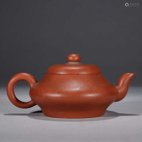 A Chinese Purple Sand Oblate Pot