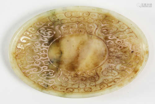 A PLATE SHAPED JADE PENDANT