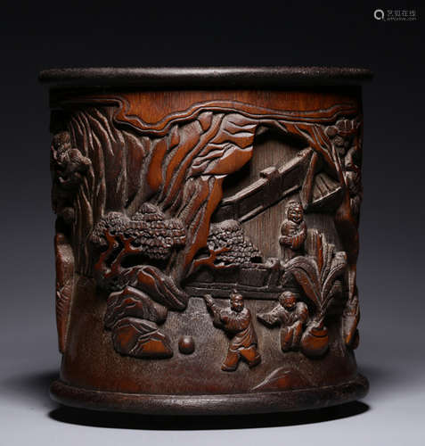 A BAMBOO CARVED BRUSH POT WITH FIGURE AND BEAST PATTERN