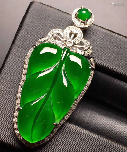 A JADEITE PENDANT SHAPED WITH LEAF