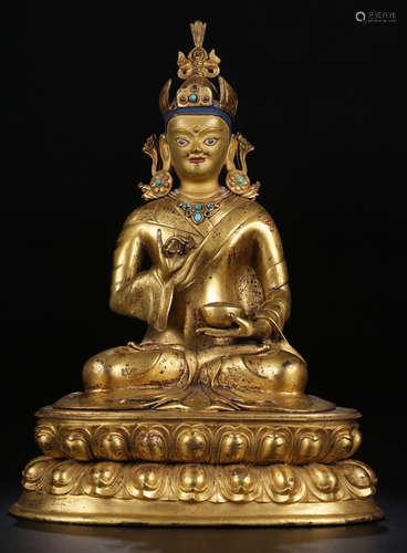 A GILT BRONZE BUDDHA