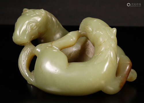 A HETIAN JADE CARVED BEAST