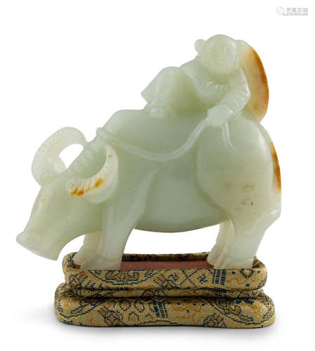 JADE BOY RIDING WATER BUFFALO ON STAND