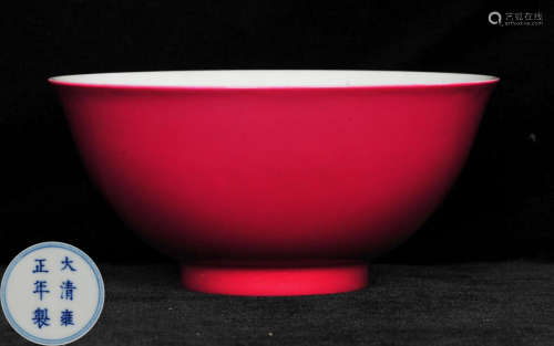 A RED GLAZE BOWL PAINTED WITH FLOWER PATTERN