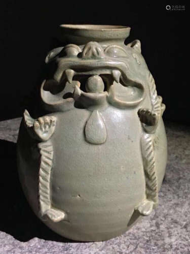A YUE YAO GREEN GLAZE VASE CARVED WITH BEAST