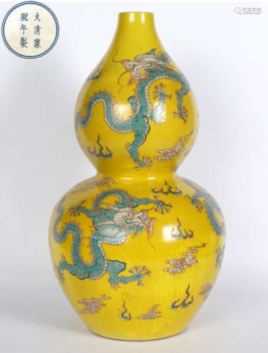 A CHINESE FAMILLE JAUNE DOUBLE GOURD VASE