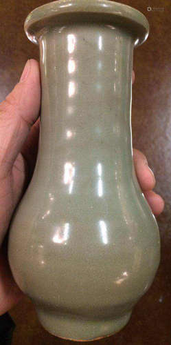 A CHRISTIE'S LONGQUAN YAO GREEN GLAZE LONG NECK VASE