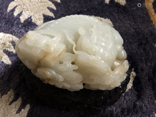 Chinese Nephrite white jade 'Qilin' with zitan stand