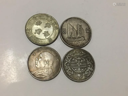 Four Chinese Coins