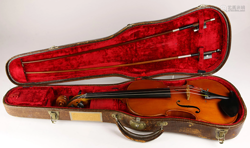 A full size violin labeled Eugene Gartner and initialed